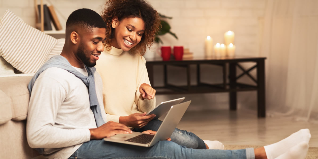 Couple reviewing a home loan application online